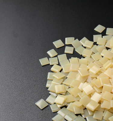 Hot binding adhesive granules
